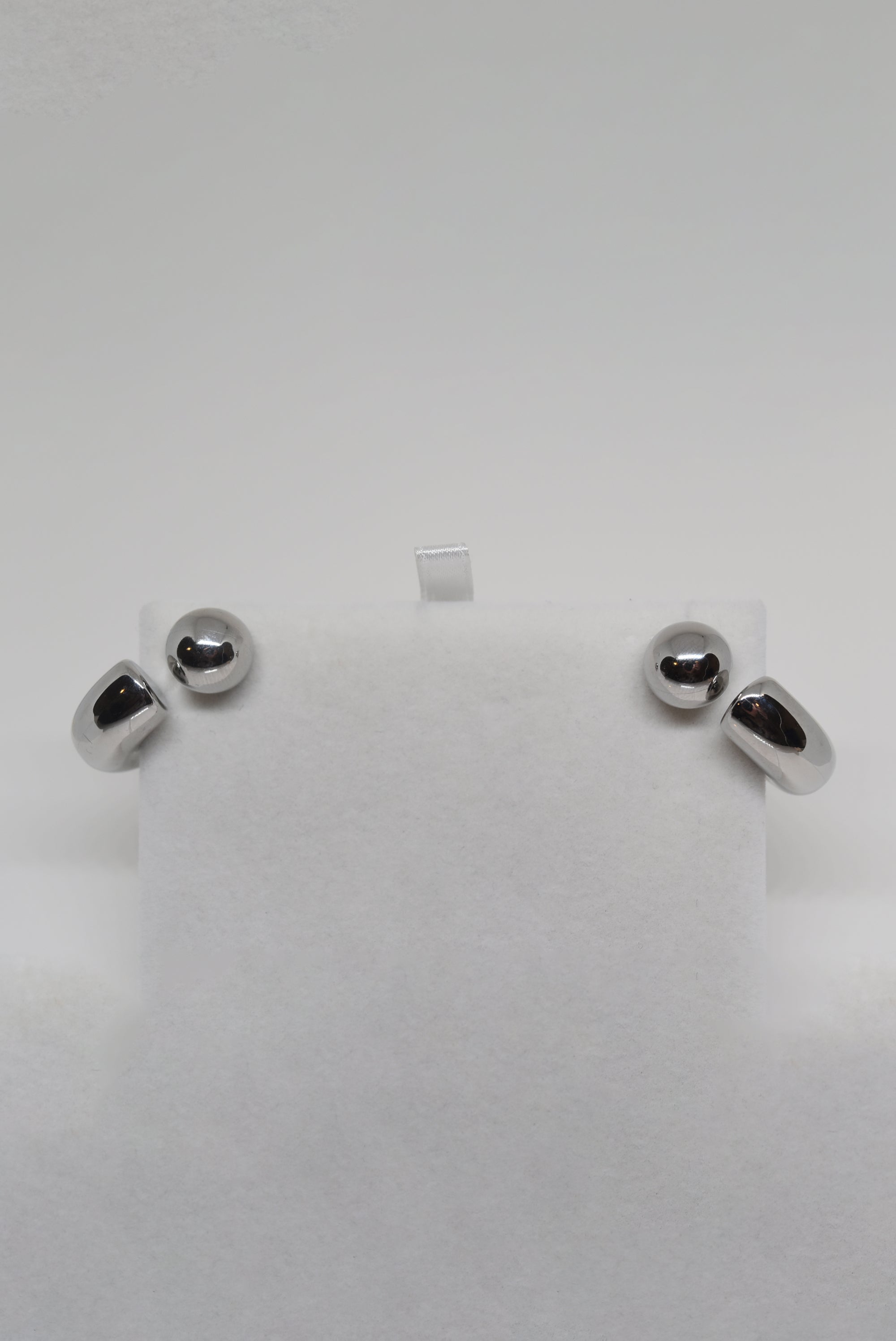 Silver Backwards Hoops